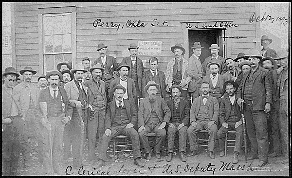 Fig 5. "Clerical force & U.S. Deputy Marshalls, U.S. Land Office, Perry, OkIa. Ter. Oct. 12, 1893." (National Archives and Records Administration, NAID 516459). 